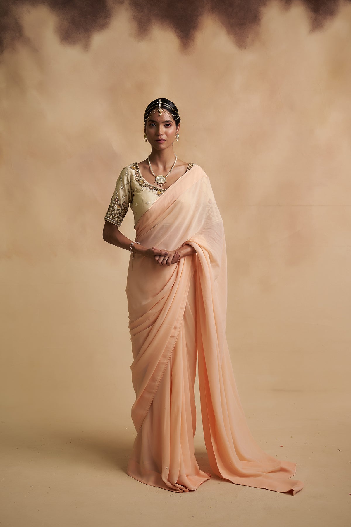 Peach Saree with Floral Motifs