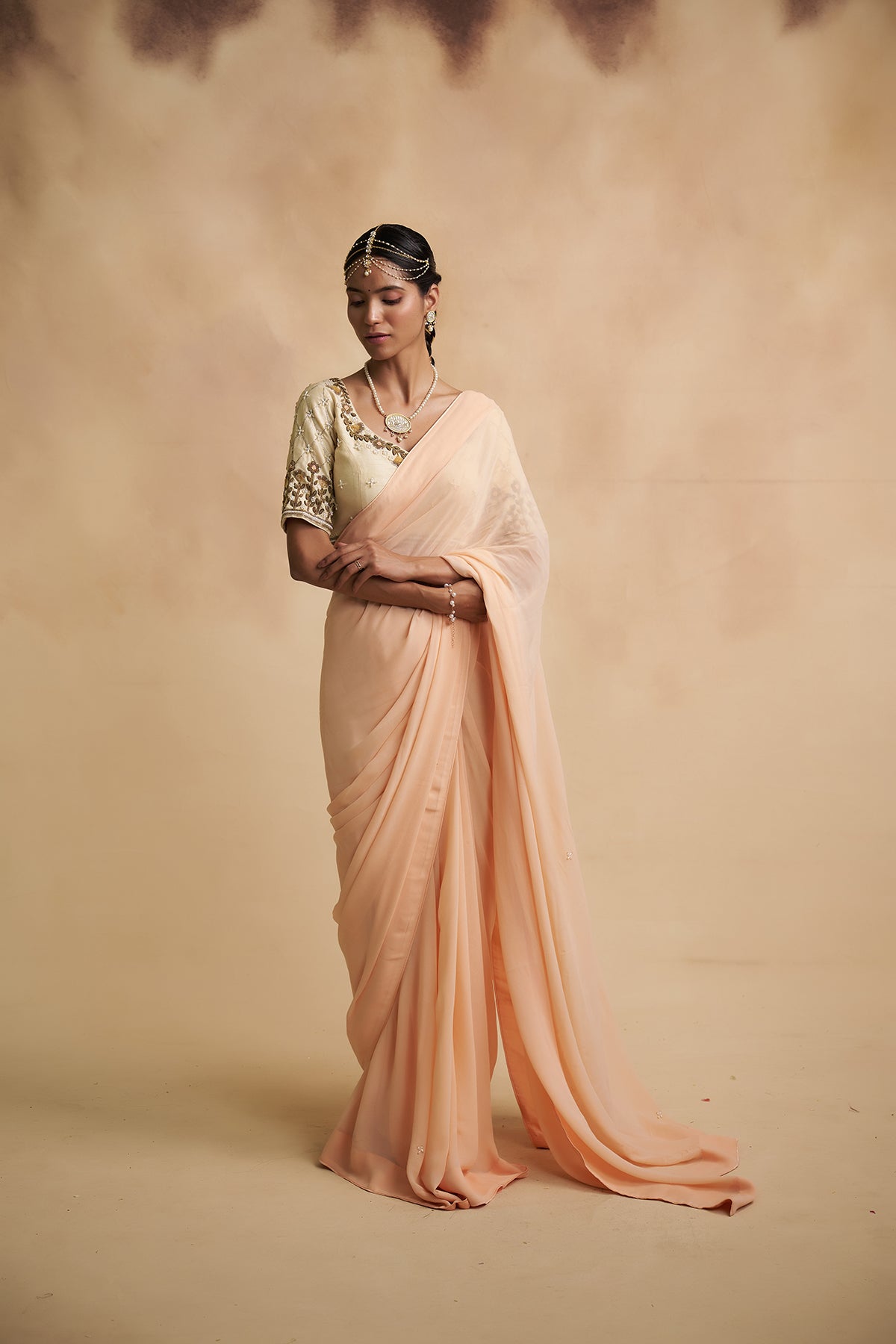 Peach Saree with Floral Motifs