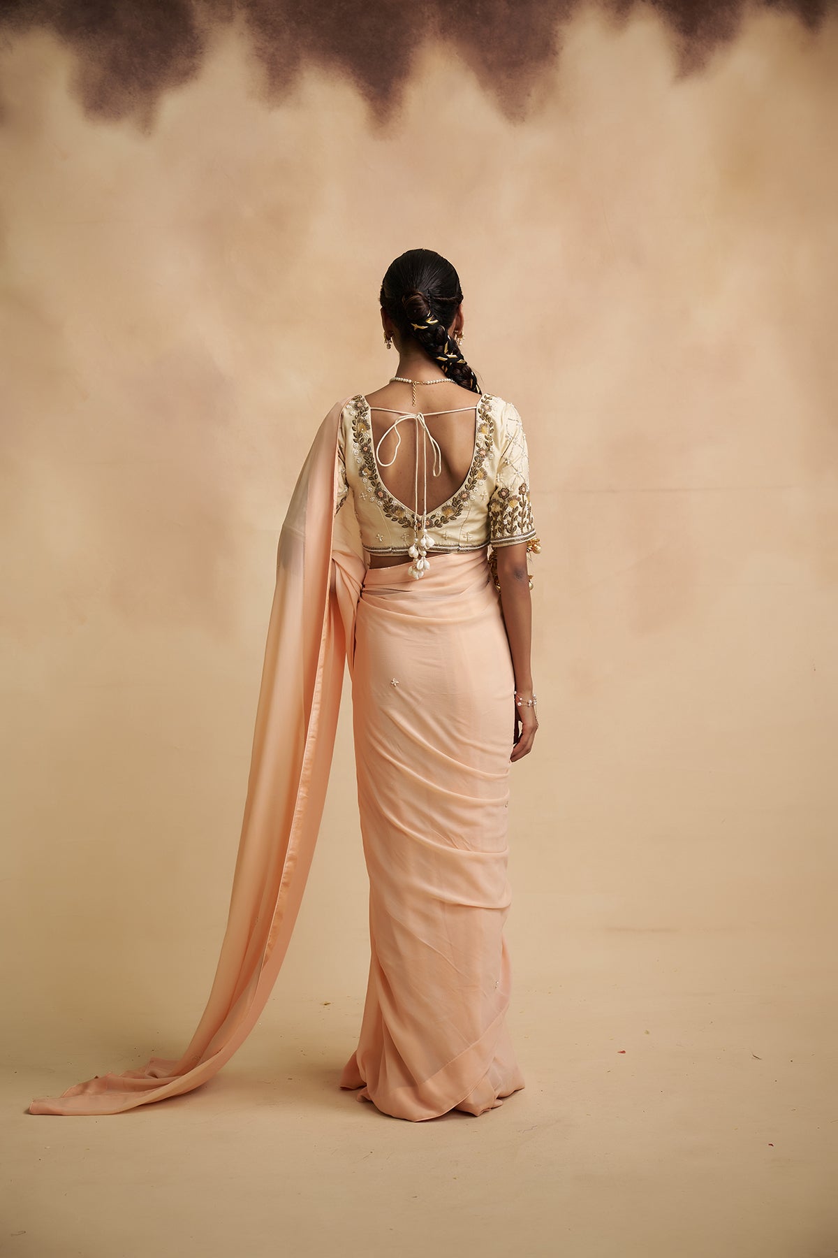 Peach Saree with Floral Motifs