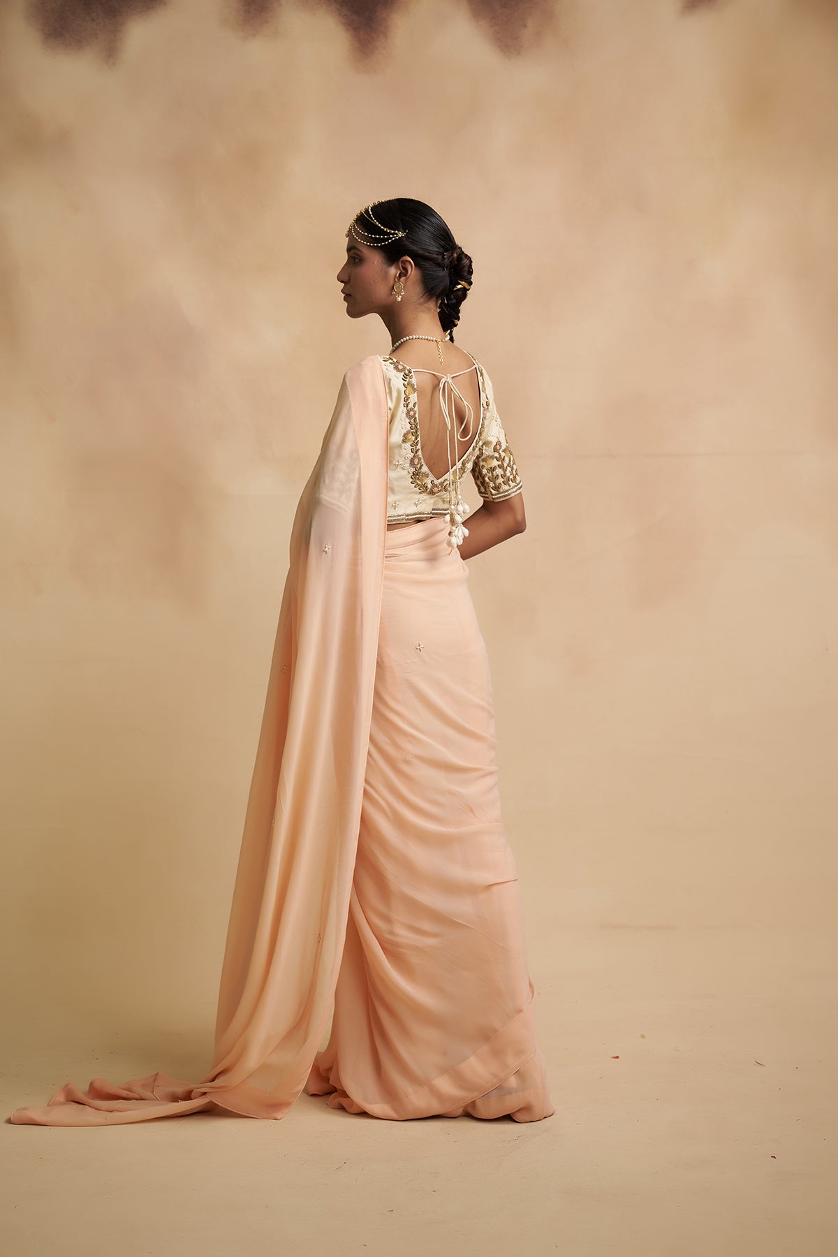 Peach Saree with Floral Motifs
